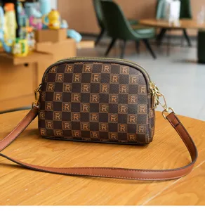 Stylish brown checkerboard monogram crossbody bag, casual dome shoulder bag with strap.