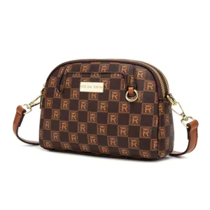Stylish brown printed shell crossbody bag with adjustable strap and gold hardware.