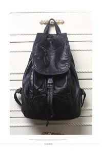 Black soft leather backpack detailed view showing retro style and elegant texture.