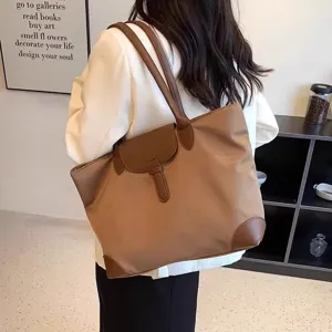 Brown oxford cloth tote bag, casual retro shoulder bag with leather flap and handles.