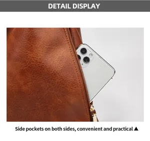 Brown PU leather shoulder bag detail display featuring convenient side pocket and smooth zipper.