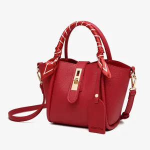Stylish red bucket bag for women, large capacity tote handbag with chic scarf and shoulder strap.