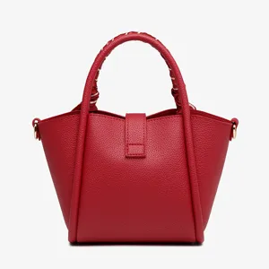 Red leather bucket bag womens tote handbag casual commuter shoulder bag with stylish handle wrap.