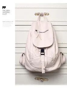 Soft leather backpack for women casual travel school daypack with zipper pocket and flap top.