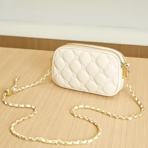 Beige quilted shoulder bag with gold chain strap, stylish camera bag for women daily casual use.