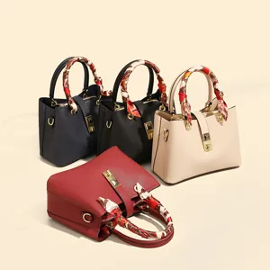 Women fashion top handle tote shoulder bag with metallic lock and twilly scarf decor main view