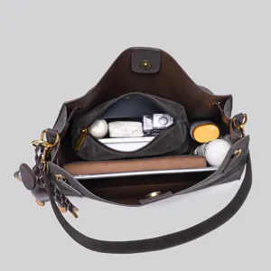 Vintage suede shoulder bag for women, large capacity tote bag with dark brown matte finish.