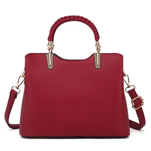 Classic red leather handbag for women, large capacity commuter shoulder tote bag main view.