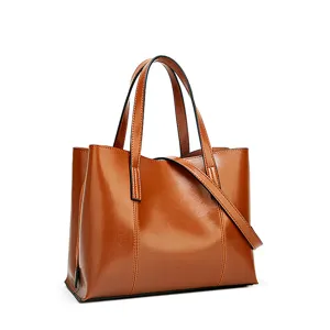 Vintage brown leather tote bag for women, large capacity shoulder and crossbody handbag.
