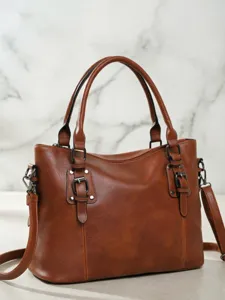 Retro large capacity commuter handbag, stylish shoulder crossbody bag for women daily wear.