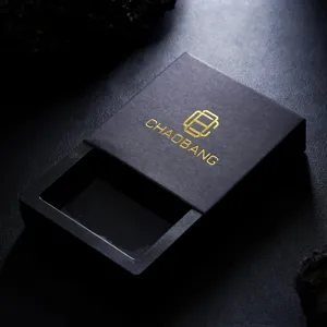 Detail view of luxury black drawer jewelry packaging box with elegant gold foil logo stamping.