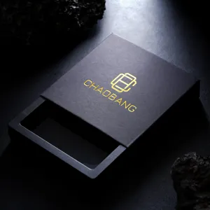 High-end black jewelry storage box drawer style with gold foil logo detail close up display.
