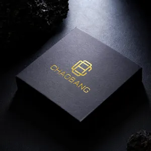 Detailed shot of luxury black jewelry box with gold stamping logo, premium minimalist design storage.