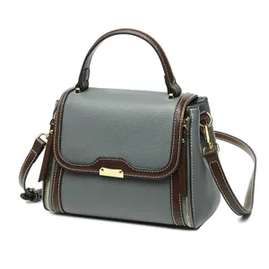 Elegant women's leather handbag, stylish top handle shoulder and crossbody bag for daily use.