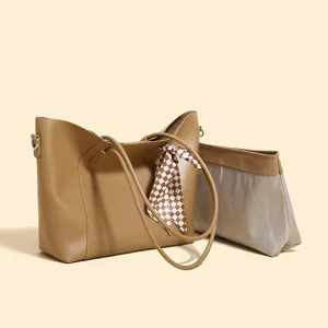 Versatile large capacity tote bag with matching inner pouch and stylish checkered scarf decoration.