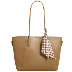 Classic brown PU leather tote bag for women, large capacity shoulder bag with stylish scarf.