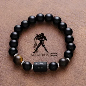 Aquarius zodiac beaded bracelet with natural black obsidian stones and stylish steel accent beads.
