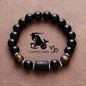 Capricorn zodiac black bead bracelet with tiger eye stone and stainless steel charm for men and women.