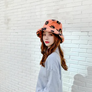Fuzzy plush bucket hat with cute floral pattern, soft warm winter hat for women daily wear.