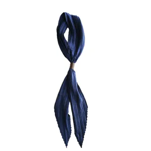 Dark blue pleated silk scarf with leather buckle, retro textured neckerchief accessory.
