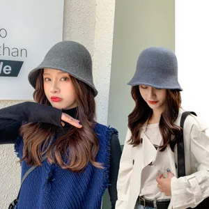 Winter knit bucket hat for women, stylish Korean warm woolen cap for cold weather daily wear.