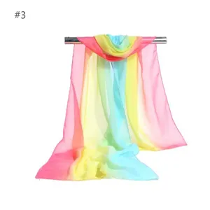 Colorful gradient chiffon scarf sheer fabric detail, lightweight rainbow display.