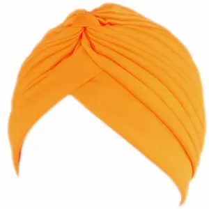 Orange cotton crossover turban hat detail, showing soft textured fabric and elegant wrap style.