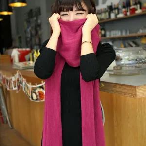 Cozy imitation cashmere winter scarf detail, soft fuchsia fabric texture for cold weather.