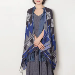 Geometric pattern tassel shawl cape for women, stylish autumn winter warm wrap apparel.