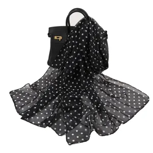Black white polka dot chiffon scarf detail view, elegant lightweight neckerchief shawl.