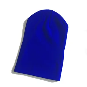 Detail view of a plain blue knit beanie hat, cozy winter warm slouchy skull cap for adults.