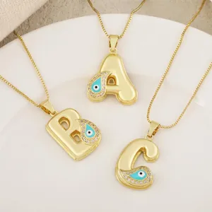 Collana con ciondolo lettera a bolla dorata con malocchio e zirconi, gioiello moda.