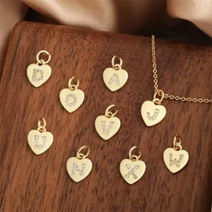 Gold plated heart letter pendant with sparkling rhinestones for DIY necklace making accessories.