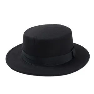 Black flat top fedora hat detail view, classic retro jazz hat for stylish autumn winter wear.