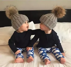 Kids winter warm knitted hat with cute fur pom pom, cozy fleece lined wool cap for boys and girls.