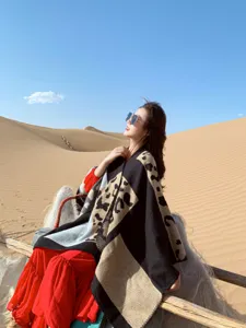 Ethnic style split shawl cape winter warm knitted cloak for outdoor fashion detail view.