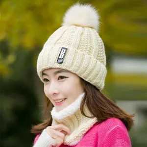 Detailed view of the Korean style winter knitted hat and scarf set in beige with a cute pom-pom.