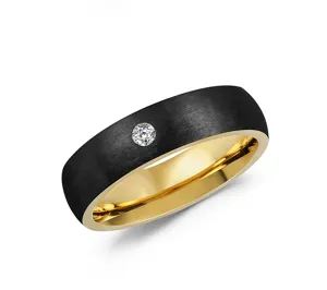 Close-up of men's titanium steel ring featuring a black brushed finish and gold inner band.