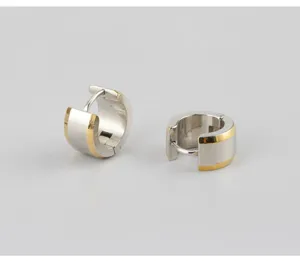 Stainless steel hoop earrings detail shot showcasing the sleek two-tone bevel design and clasp.