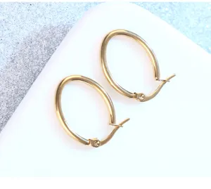 Gold stainless steel oval hoop earrings, minimalist geometric design for daily wear.