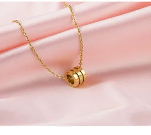 Close-up detail view of the elegant rose gold titanium steel small waist pendant necklace.