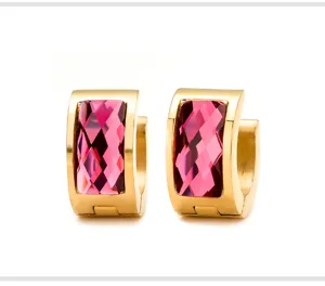 Fashion gold-tone stainless steel huggie earrings with sparkling pink crystal stones.