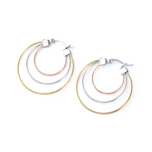 Minimalist tri-color triple hoop earrings in stainless steel, elegant geometric daily jewelry.