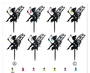 Fairy garden stake detail showing black silhouette fairy design with colorful hanging lantern.