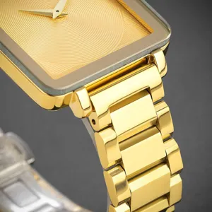 Minimalist square gold quartz watch detail view with solid steel strap and textured dial.