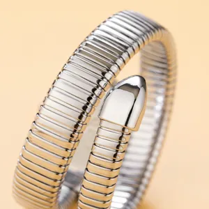 Exquisite silver tone coiled snake wrap quartz watch featuring a sleek flexible tubogas design.