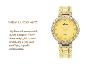 Detail shot of golden women quartz watch with rhinestone bezel and metal mesh strap.