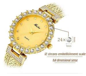Gold quartz ladies watch with yellow dial and sparkling zircon stone embellished mesh metal band.