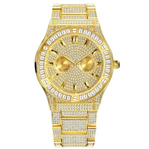 Gold iced-out men's quartz watch detail, large paved dial with sparkling crystal bezel.