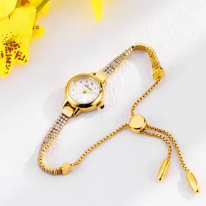 Exquisite golden rhinestone ladies watch with adjustable pull-chain design for elegant wear.